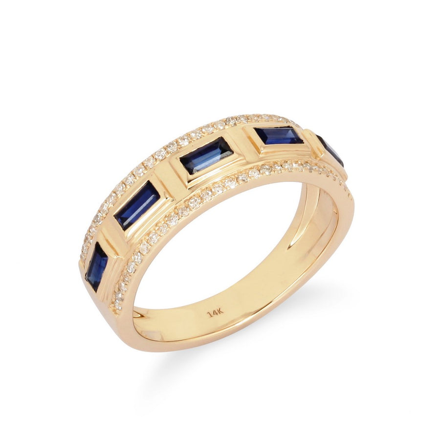 Yellow gold channel-set ring with baguette-cut blue sapphires and pavé diamond edges