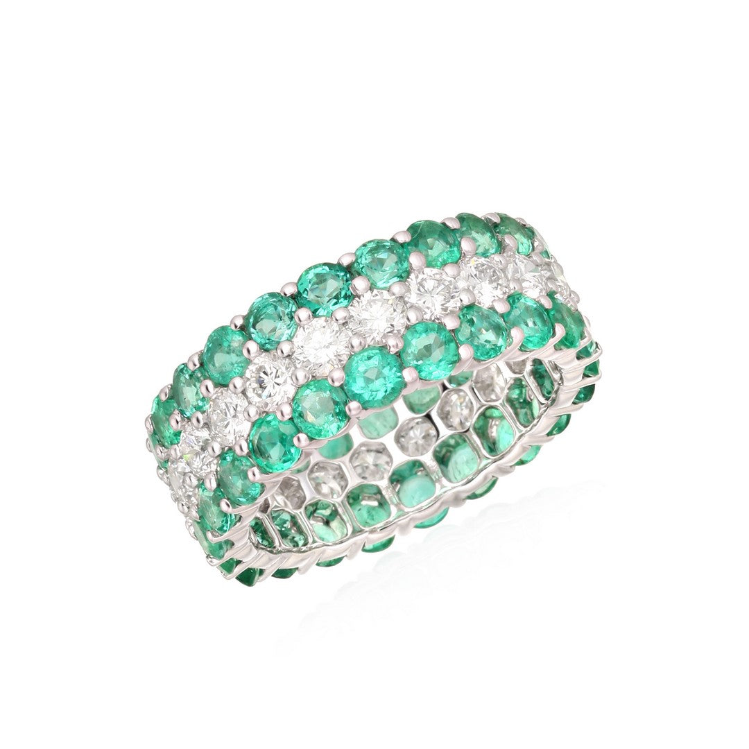 White gold triple-row eternity ring with two rows of round green emeralds and a center row of white diamonds