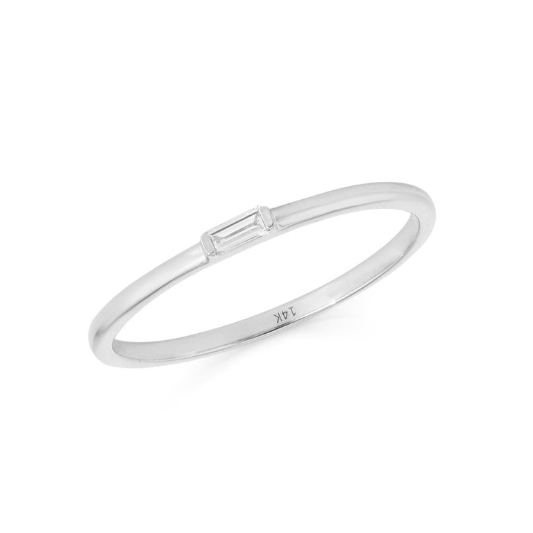 White gold ring with a baguette-cut diamond bar on a white background