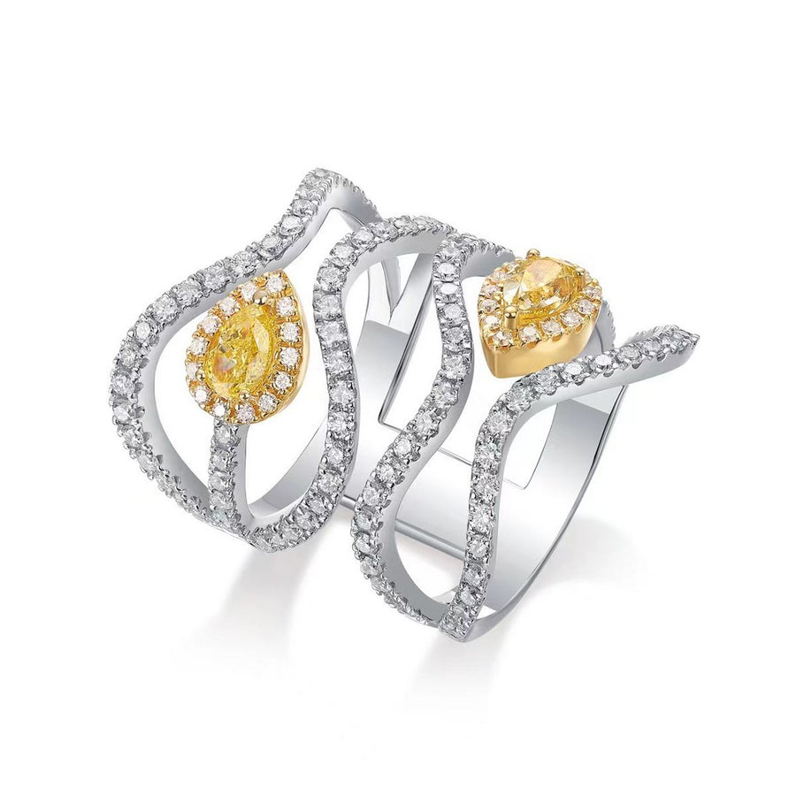 White gold double band ring with pear-shaped yellow diamonds and white diamond pavé accents on a white background